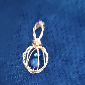 Elegant Gold Wire Wrapped Pendant